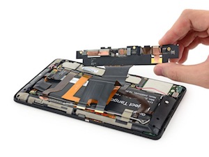 A phone being dismantled—Aceon performs phone data recovery with great precision and care when handling your devices.